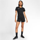 Nike Dri FIT Park VII Shirt Short Sleeve Womens in Black/White with black nike socks and black nike trainers