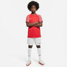 University Red Nike tee with Nike Dri FIT Park III Short in White/University Red and white nike socks and white nike football boots