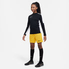 Black/White Nike 1/4 Zip Track Jacket with Nike Dri FIT Park III Short in University Gold/Black and black nike socks and black nike trainers