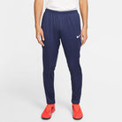 Nike Park 20 Knit Pant in Obsidian with orange nike trainers