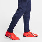 Nike Park 20 Knit Pant in Obsidian with orange nike trainers