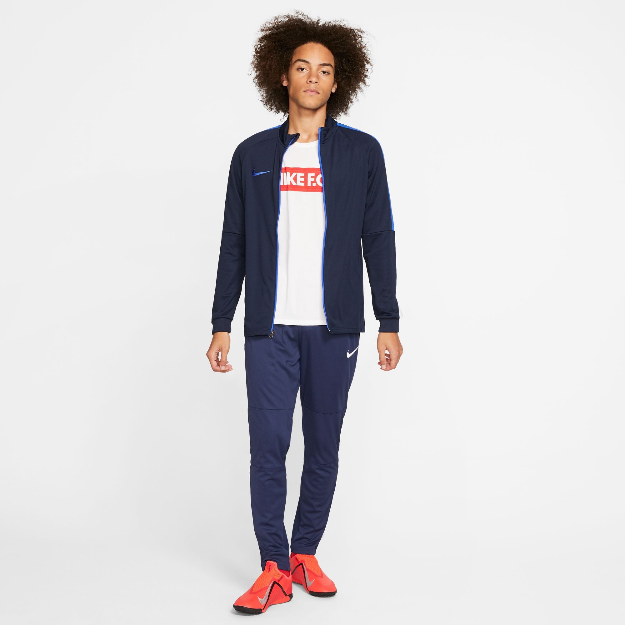 Nike Park 20 Knit Pant in Obsidian with orange nike trainers