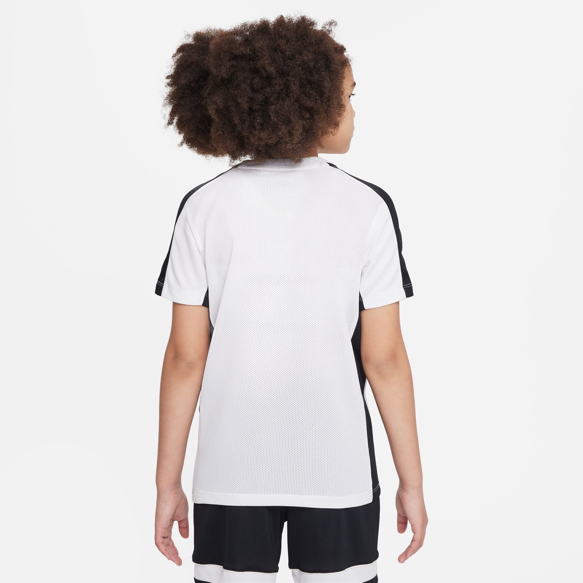 Back of Nike Dri FIT Academy 23 Short Sleeve white and black Shirt with black nike shorts