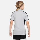 back of Nike Dri FIT Academy 23 Short Sleeve Polo in Wolf Grey/Black