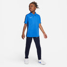 Nike Dri FIT Academy 23 Short Sleeve Polo in Royal Blue/Obsidian with obsidian nike tracksuit bottoms and white nike trainers