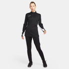 Nike Dri FIT Academy 23 1/4 Zip Women's Drill Top in black with black nike tracksuit bottoms and black nike trainers