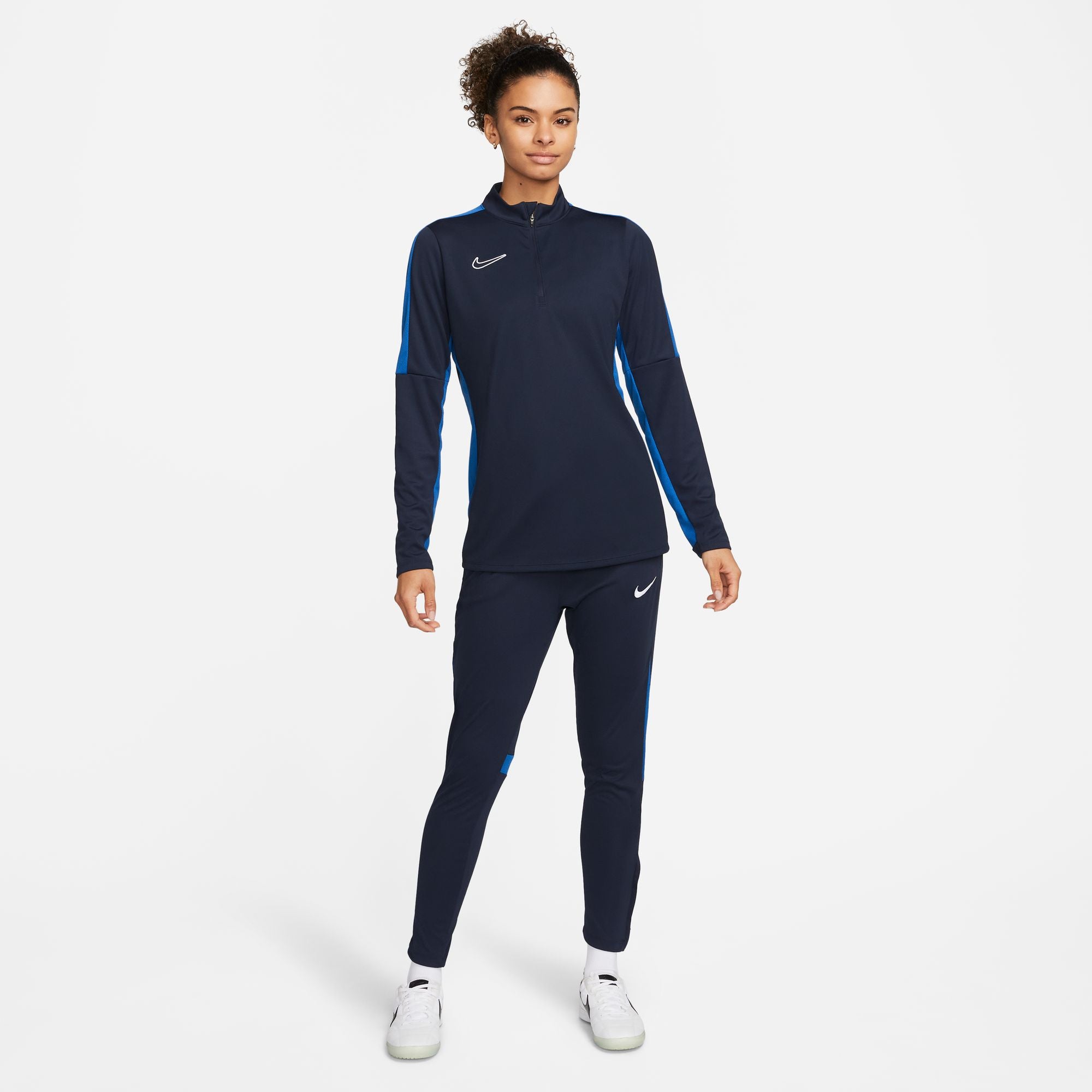 Nike Dri FIT Academy 23 1/4 Zip Women's Drill Top in dark blue obsidian with nike tracksuit bottoms in navy and white nike trainers