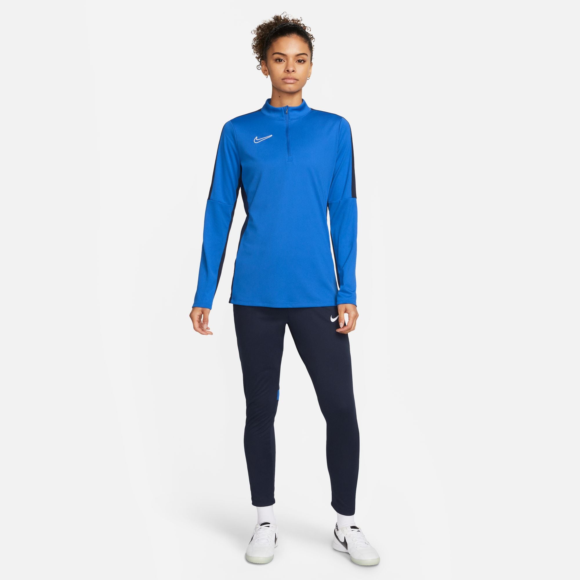 Nike Dri FIT Academy 23 1/4 Zip Women's Drill Top in Royal Blue with navy nike tracksuit bottoms and white nike trainers