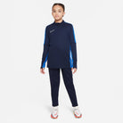 Nike Dri-FIT Academy 23 1/4 Zip Obsidian Drill Top with obsidian dark blue nike tracksuit bottoms with white nike football boots