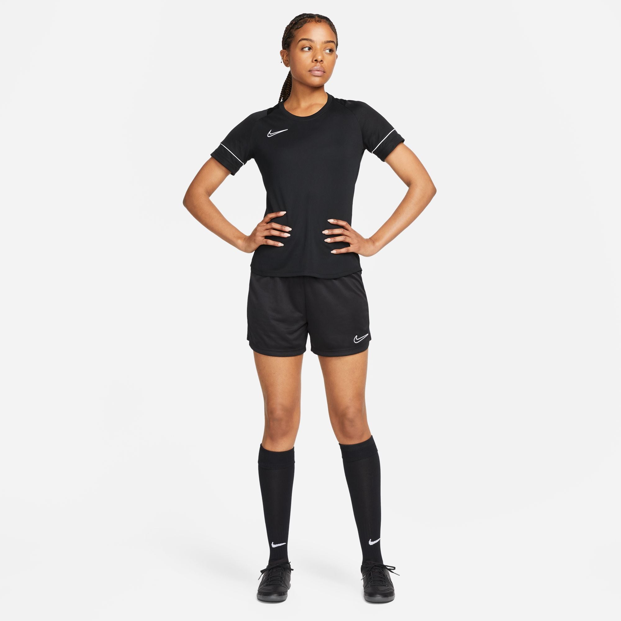 Nike Dri FIT Academy 23 Women's Knit Shorts in black with black nike tee and black nike socks and black nike trainers