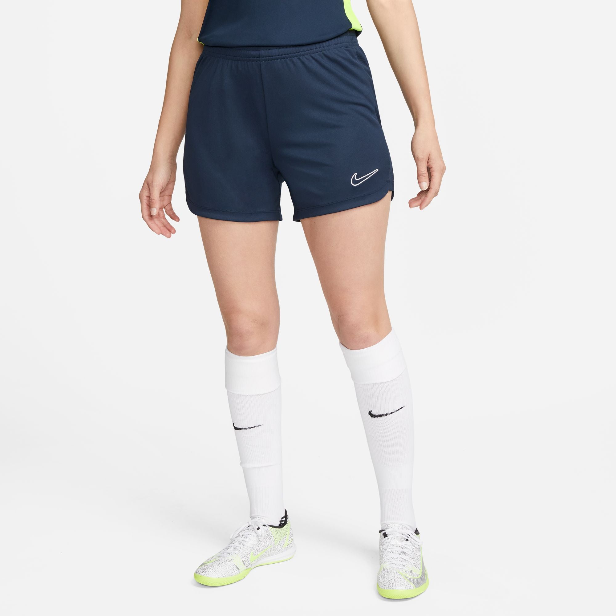 Nike Dri FIT Academy 23 Women's Knit Shorts in obsidian dark blue with white nike socks and white nike trainers