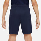 Back of Nike Dri FIT Academy 23 Knit Shorts in dark blue nike obsidian