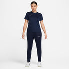 Nike Dri FIT Academy 23 Women's Knit Pants in obsidian dark blue with dark blue nike tee and obsidian nike tracksuit bottoms and white nike trainers