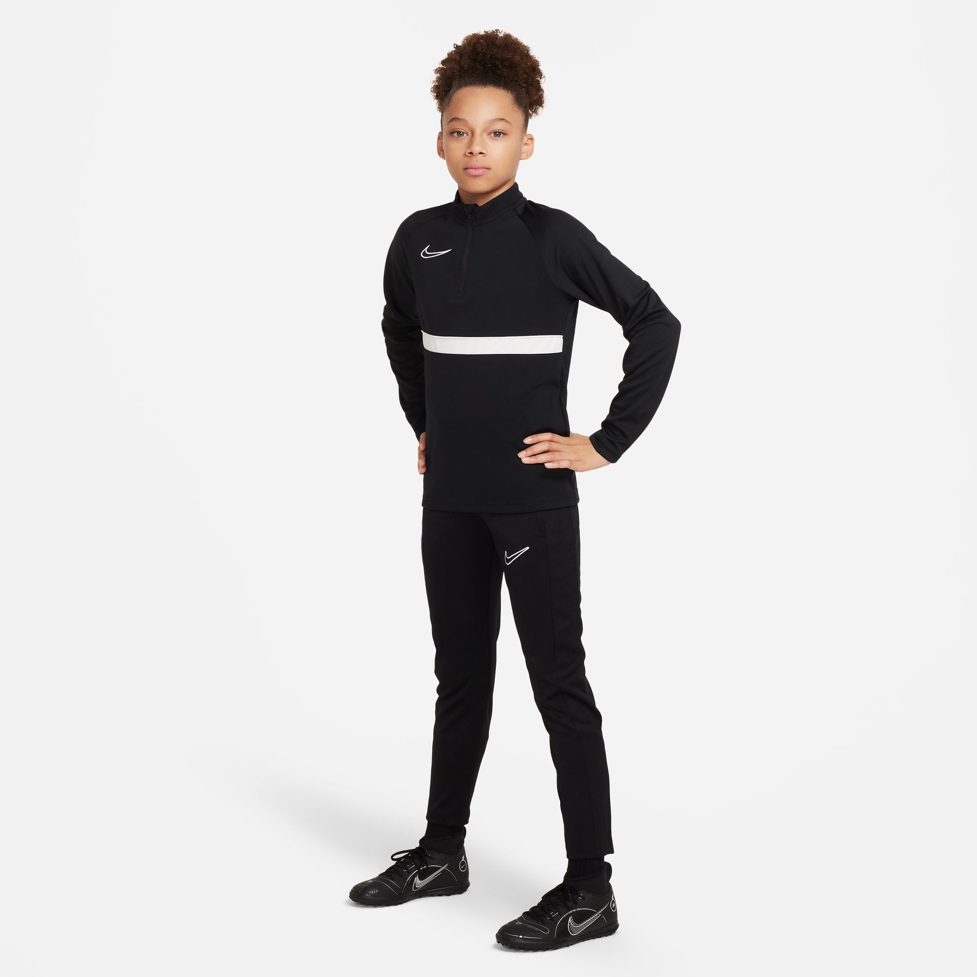 Nike Dri FIT Academy 23 black Knit Pants with black nike 1/4 track top and black nike trainers