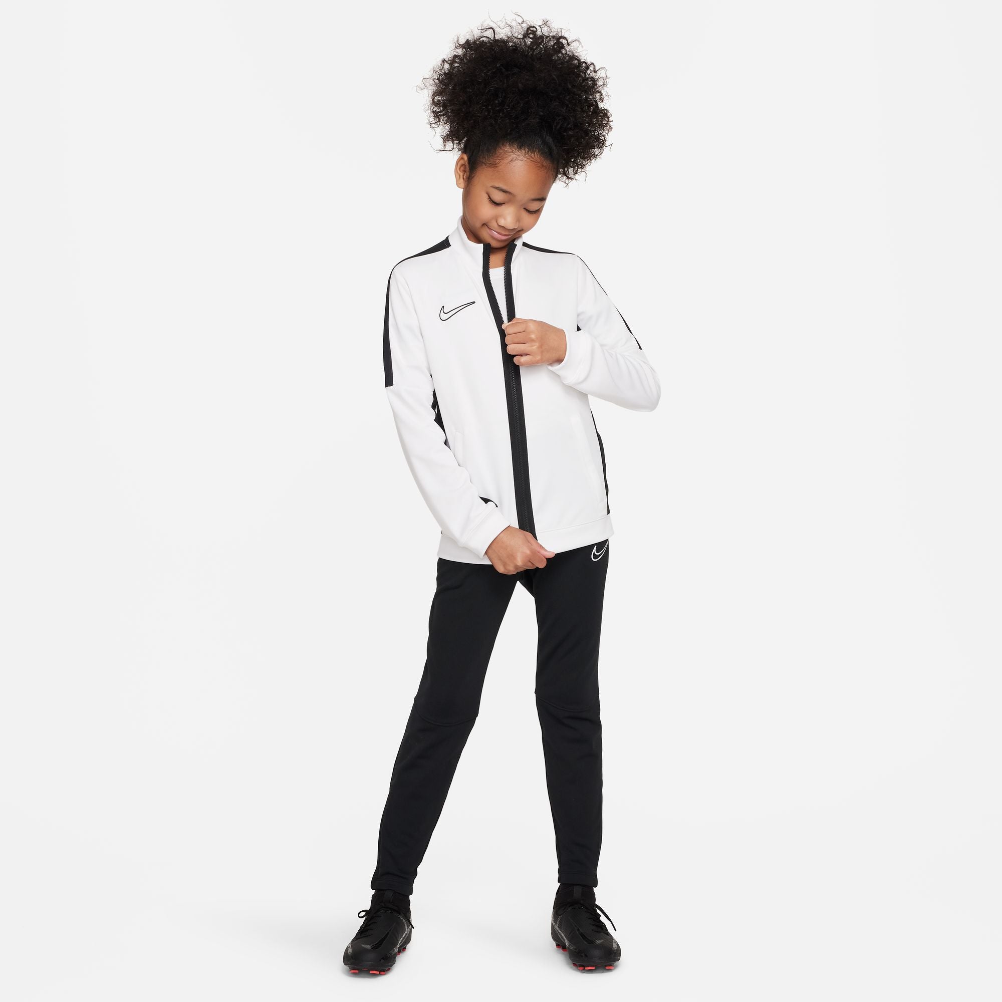 Nike Dri FIT Academy 23 Knit Track Jacket in White/Black with black nike tracksuit bottoms and black nike trainers