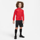 Nike Dri FIT Academy 23 Knit Track Jacket in University Red/Gym Red with black nike shorts and black nike socks and black nike trainers