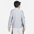 Back of Nike Dri FIT Academy 23 Woven Track Jacket in Wolf Grey/Black