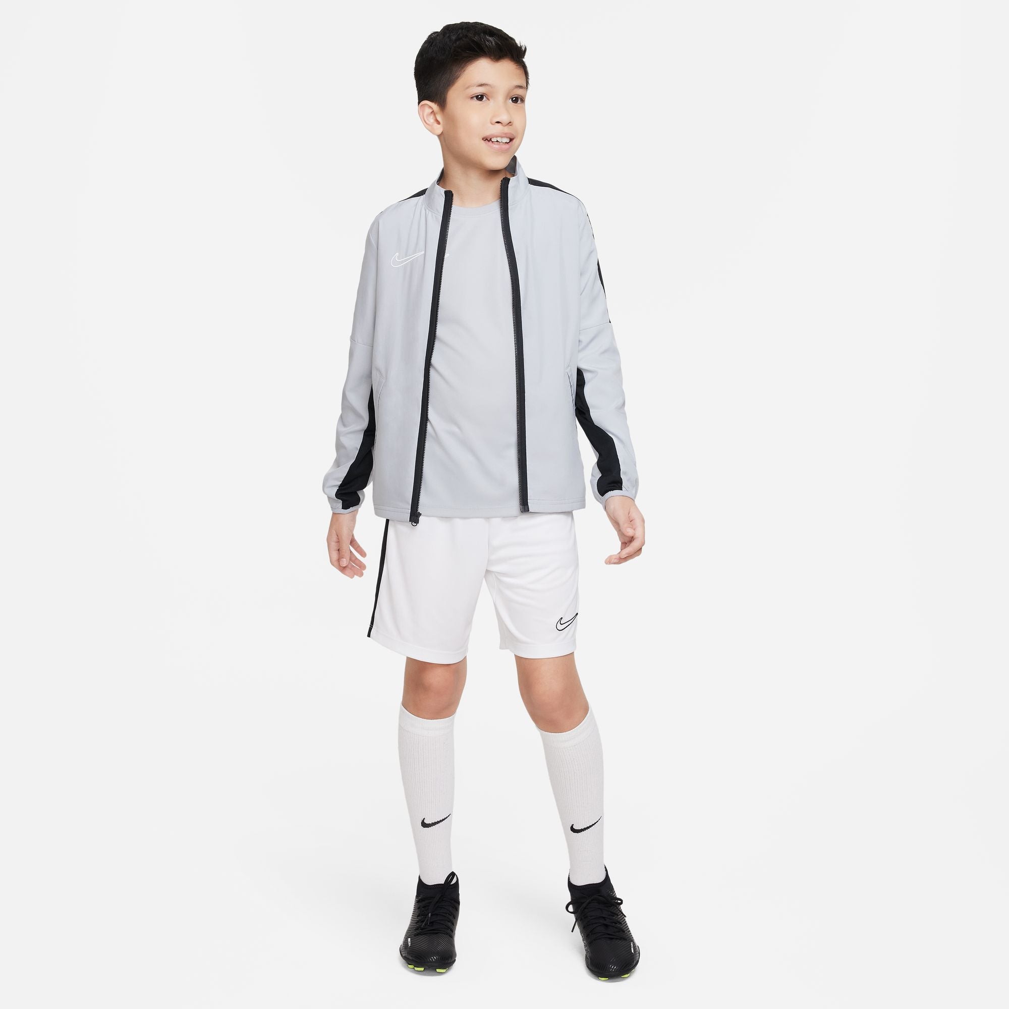 Nike Dri FIT Academy 23 Woven Track Jacket in Wolf Grey/Black in white nike shorts and white nike socks and black nike trainers