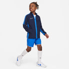 Nike Dri FIT Academy 23 Woven Track Jacket in Obsidian with royal blue nike shorts and white nike socks and white nike trainers