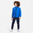 Nike Dri FIT Academy 23 Woven Track Jacket in Royal Blue with obsidian nike tracksuit bottoms and white nike trainers