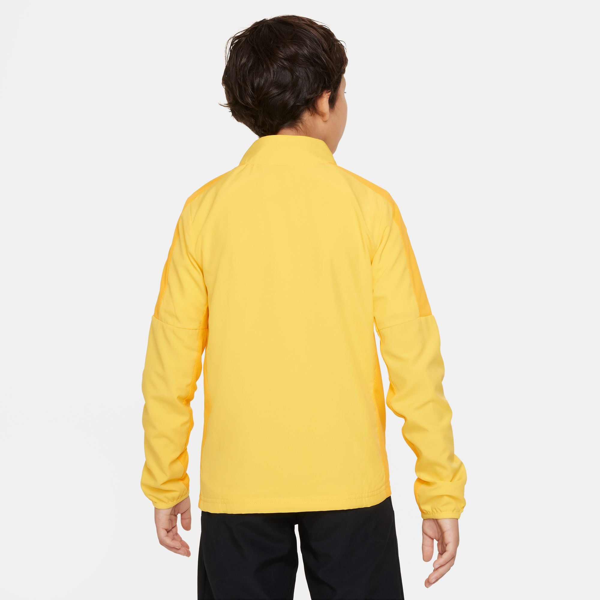 Back of Nike Dri FIT Academy 23 Woven Track Jacket in Tour Yellow/University Gold