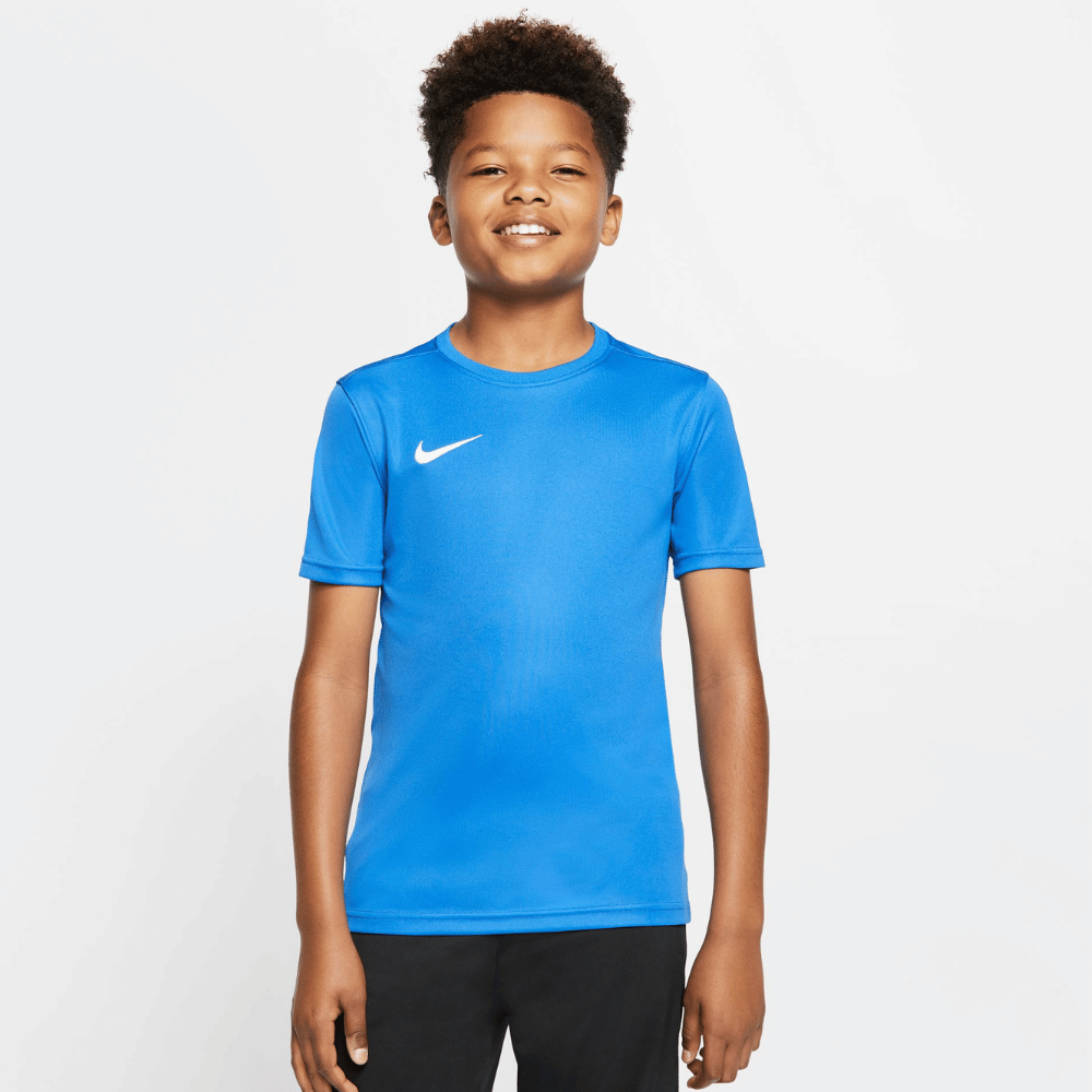 Boy Wearing Nike Dri FIT Park VII Short Sleeve Shirt in Royal Blue